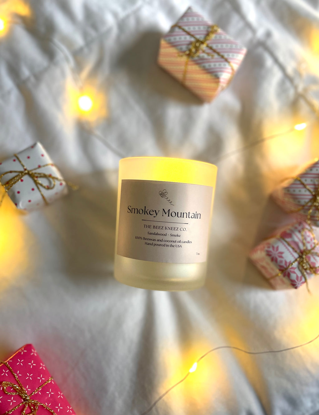 00% beeswax and coconut oil candle with sandalwood and smoke essential oil. Hand-poured non-toxic candles