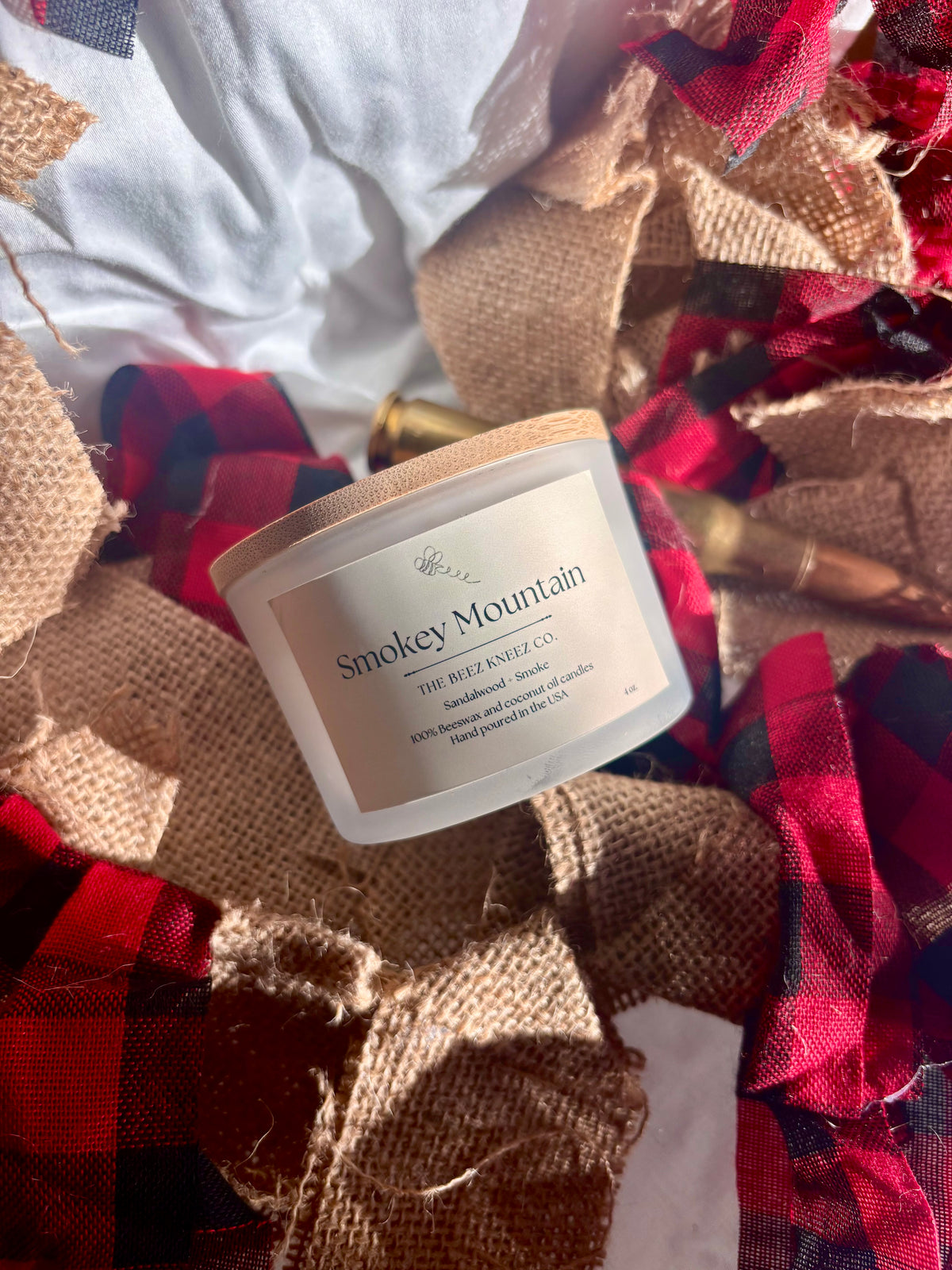 Non-toxic beeswax and coconut oil candle with essential oils like sandalwood and smoke